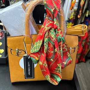 Tan Handbag with Red Scarf